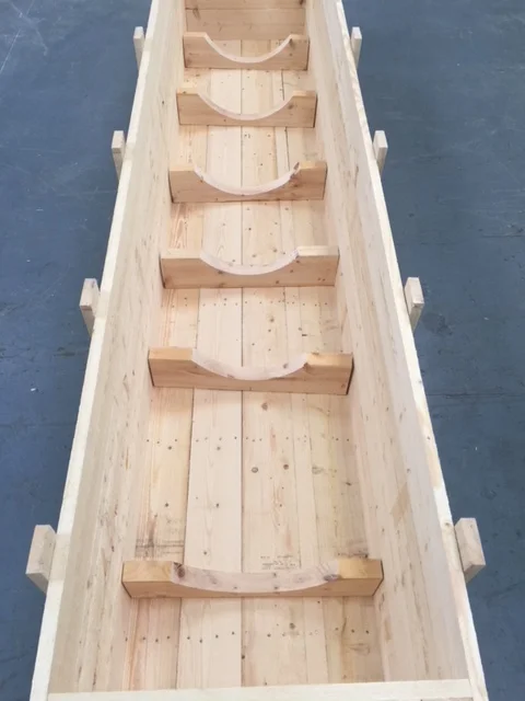 Shaped supports inside a timber case